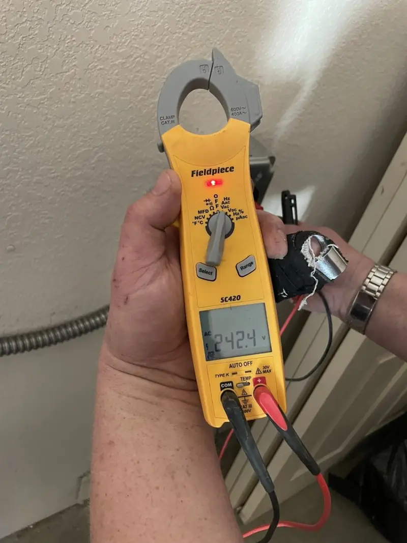 Voltage testing with clamp meter during Hot Tub / Pool Electrical Wiring in Lawton